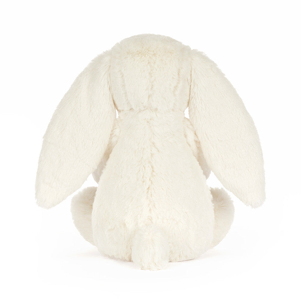 back view of white bunny rabbit plush on white background
