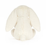 back view of white bunny rabbit plush on white background