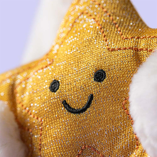 detail view of smiling yellow star