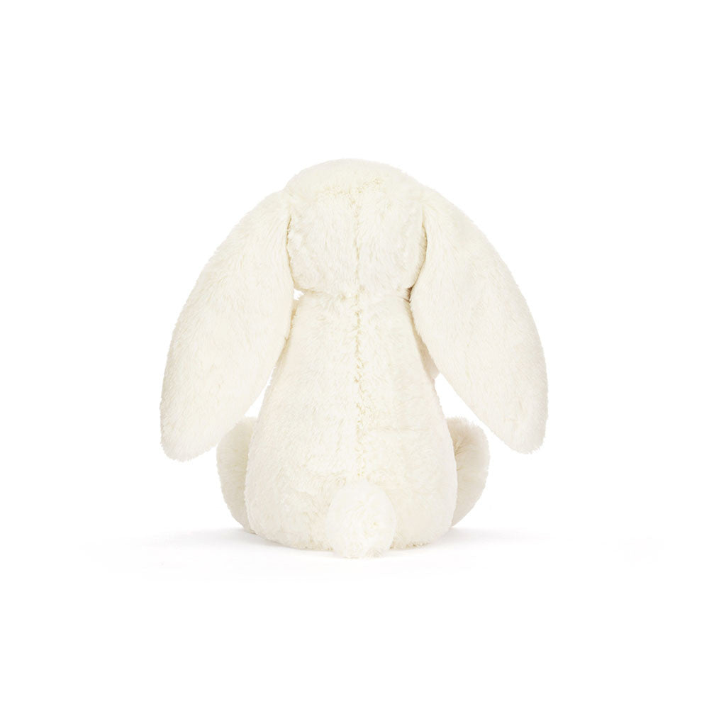 back view of White plush bunny toy on a white background
