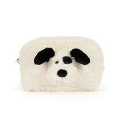 A fluffy faux-fur pouch shaped like a dog face, featuring black ears, nose, and eyes on a white background.