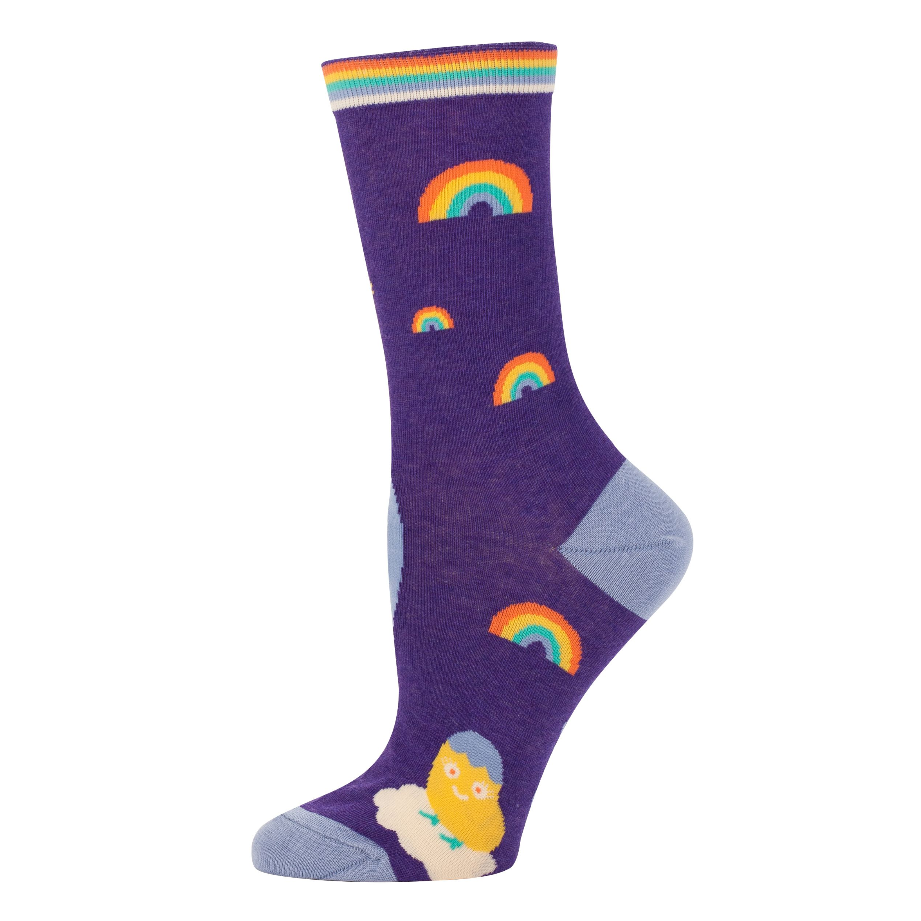 blue socks with a baby chick on a rainbow and cloud that says shitting rainbows kind of day. Also has mini rainbows around 