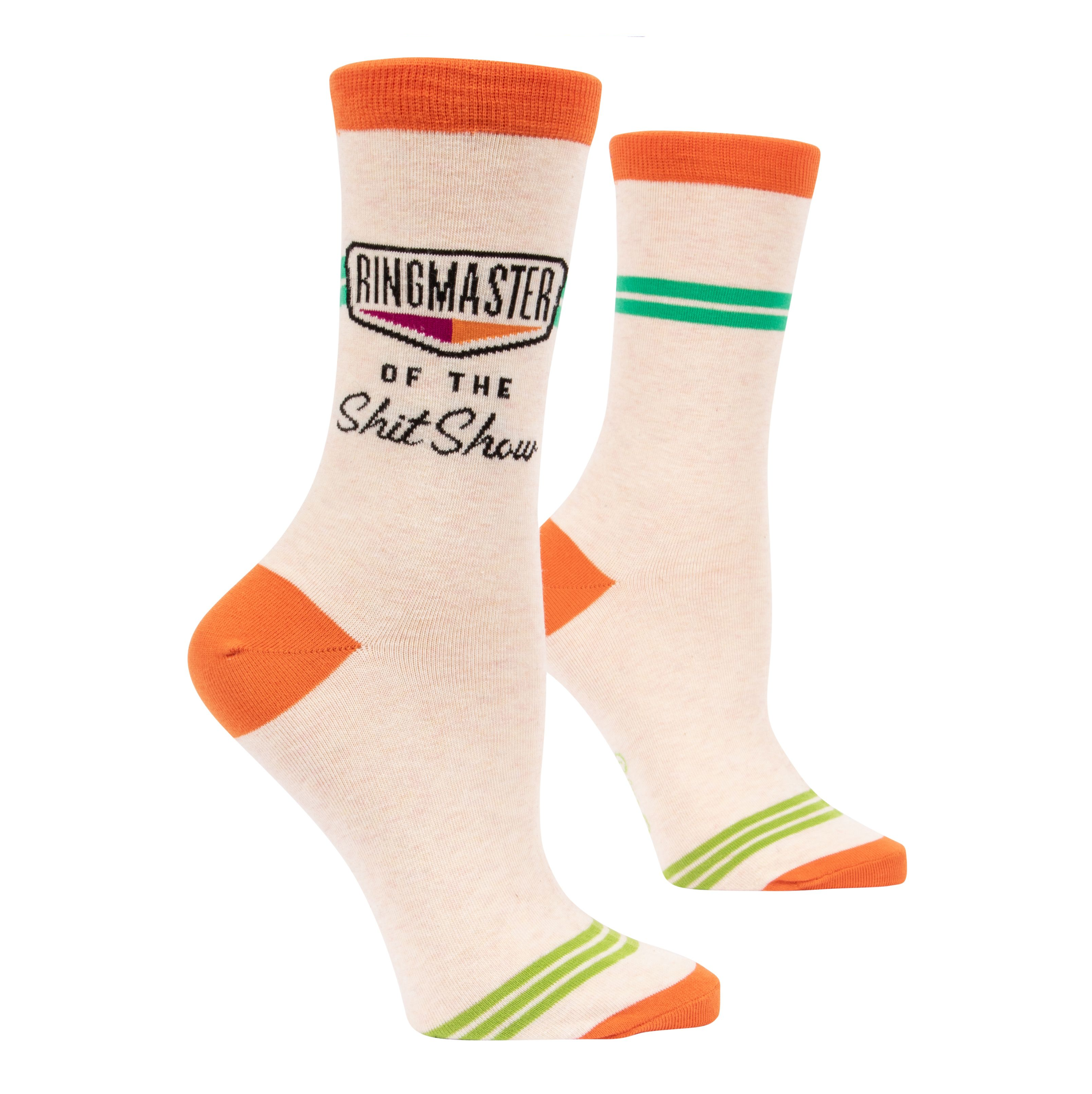 cream sock with orange tips and green lines on side it says ringmaster  of the shit show
