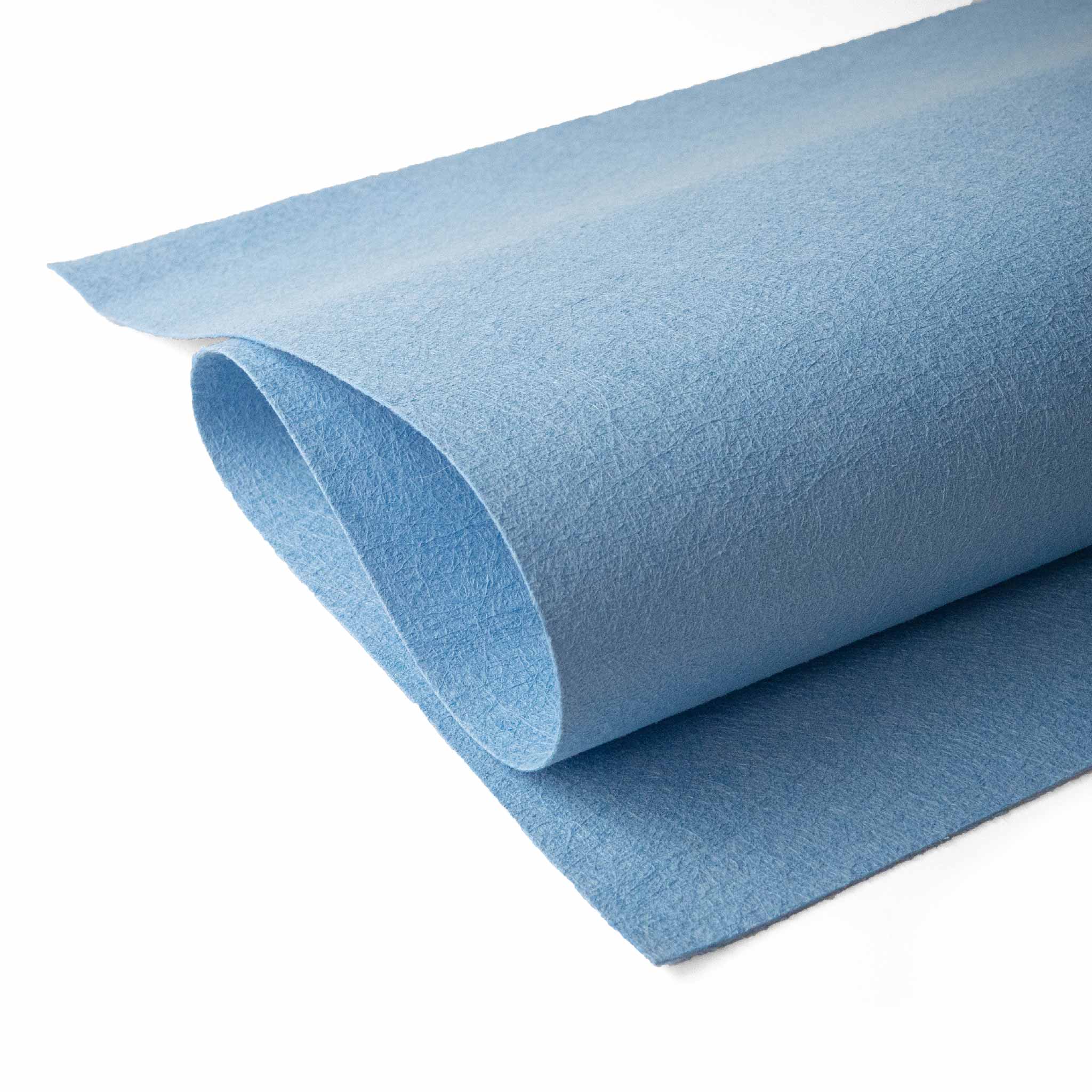 Roll of blue jude's cleaning cloth on a white background