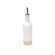 White ceramic bottle with a metallic cap on a white background