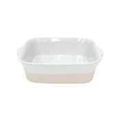White ceramic baking dish with beige base on a white background