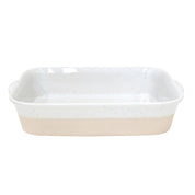 Rectangular ceramic baking dish with speckled pattern on a white background
