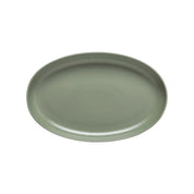 Green ceramic plate on a white background