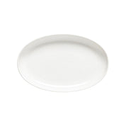 White ceramic plate  by pacifica on a white background
