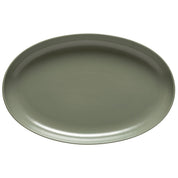 Green ceramic platter on a white background