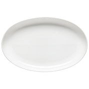 White oval plate  by pacifica on a white background