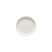 White ceramic plate with speckled texture on a white background