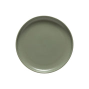 Green ceramic plate on a white background