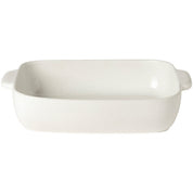 White ceramic baking dish  by pacifica with handles on a white background