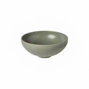 green ceramic bowl on a white background