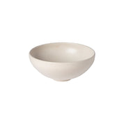 Beige ceramic bowl on a white background