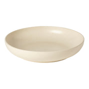 Beige ceramic bowl on a white background