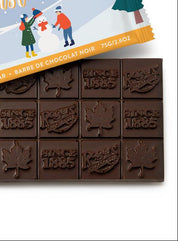 dark roger's chocolate bar with christmas packaging on white background