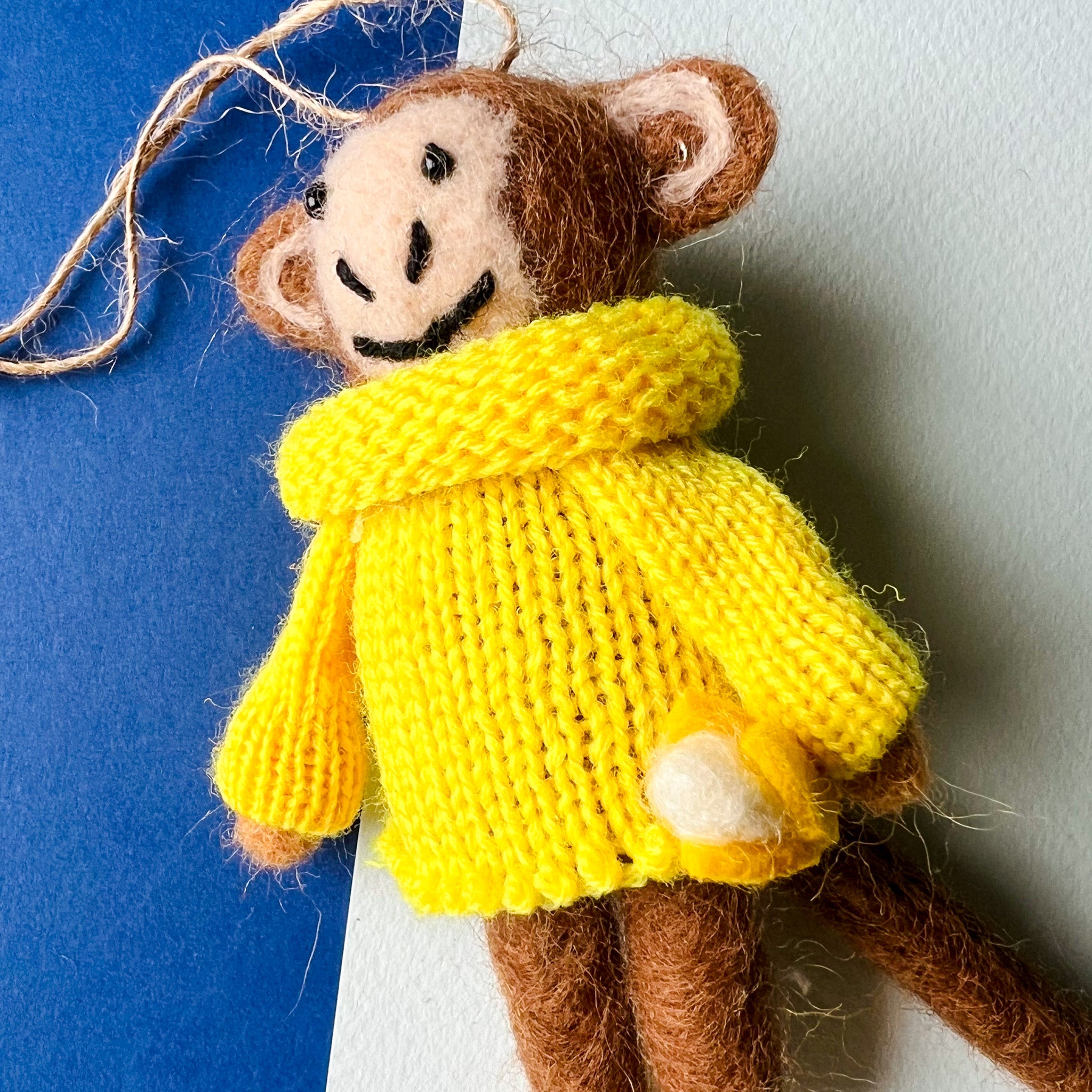 MONKEY WITH BANANA ORNAMENT