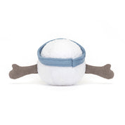 back view of stuffed plush toy of white golf ball with light blue visor hat made by jellycat