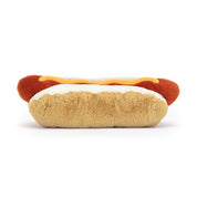 back view of fluffy stuffed plush toy hotdog with mustard made by jellycat