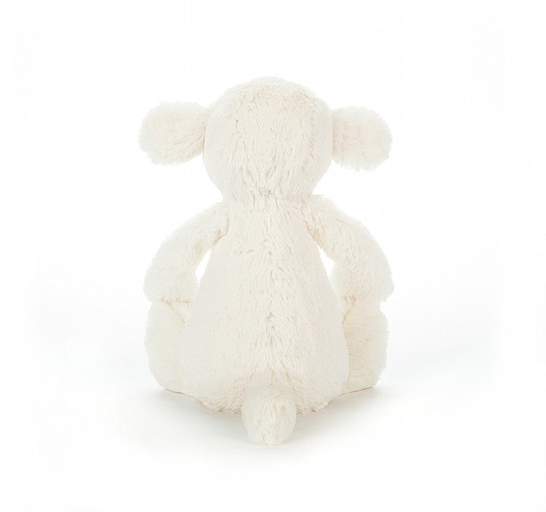 back view of soft white lamb stuffed plush toy made by jellycat