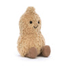 light brown fluffy stuffed plush toy peanut with black smiley face made by jellycat