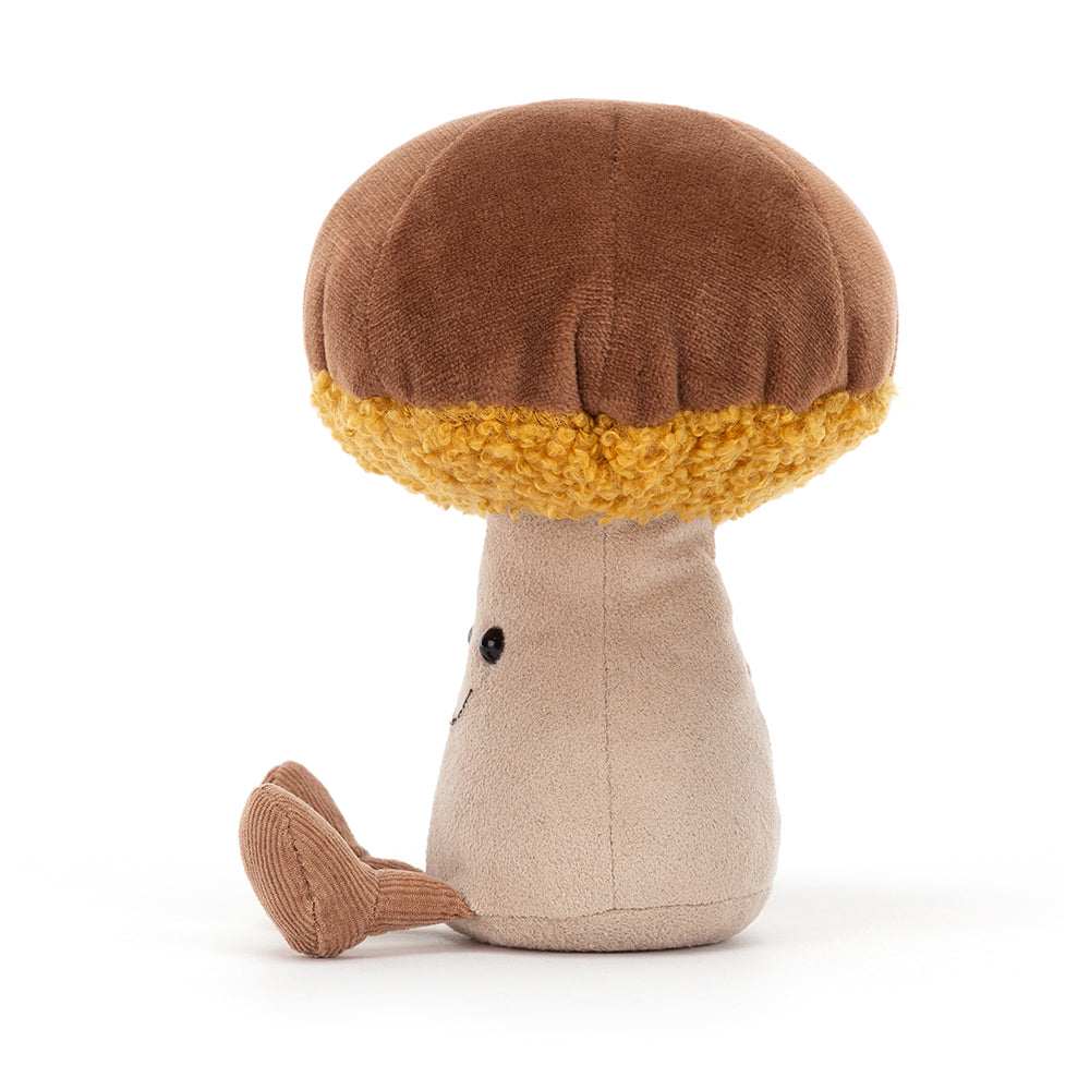 side view of fuzzy soft stuffed plush toy of brown toadstool made by jellycat