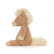 side view of Plush toy pony with a white mane and tail on a white background