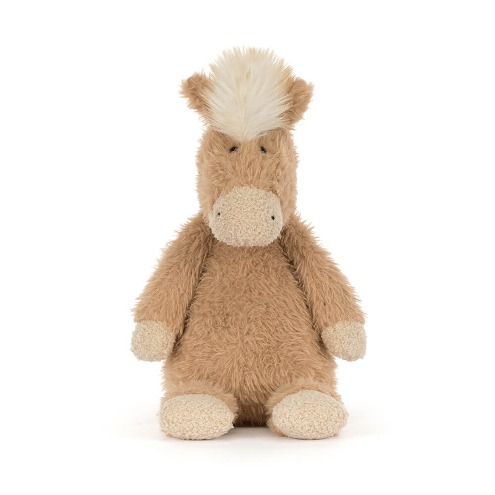 Plush toy beige pony with a white features on a white background