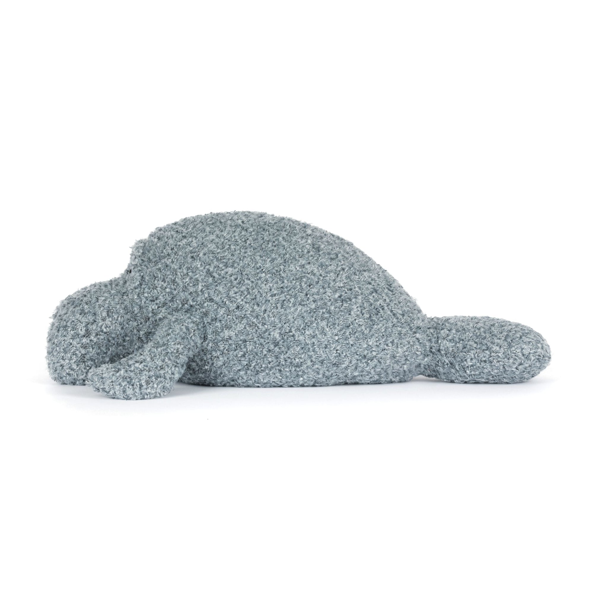 side view of Textured gray manatee jellycat plush toy on a white background
