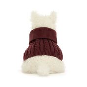 backview of A plush jellycat West Highland terrier dog toy wearing a burgundy cable-knit sweater, set against a plain white background.