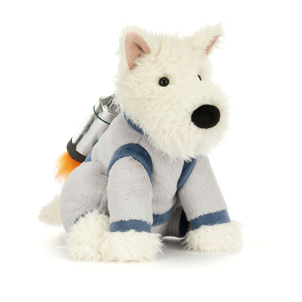 Plush  toy white scottie dog in grey spacesuit with rocket pack on back on white background 