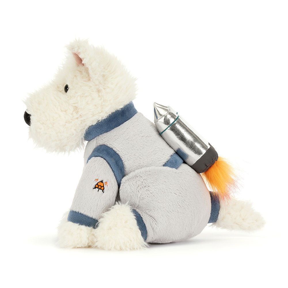 side view of plush toy white scottie dog in grey spacesuit with rocket pack on back on white background 