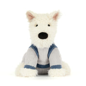 Plush  toy white scottie dog in grey spacesuit on white background 