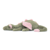 Green jellycat dragon toy with pink accents on a white background
