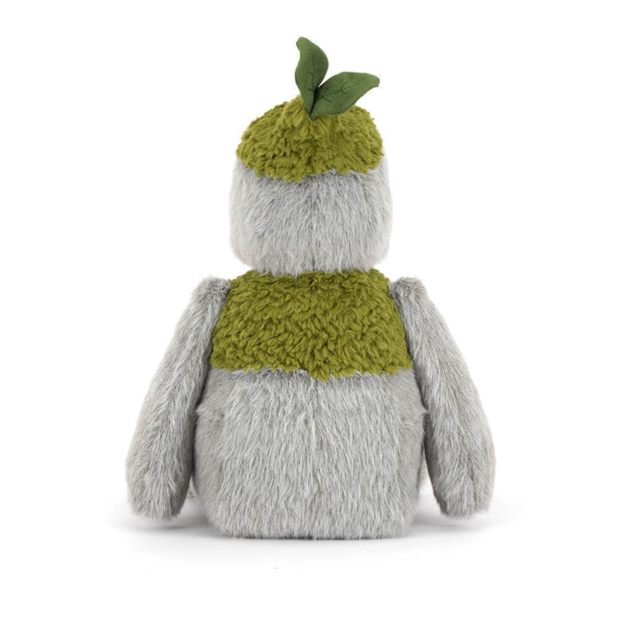 back view of jellycat plush toy rock creature with a green mossy hat and mossy lapel on a white background