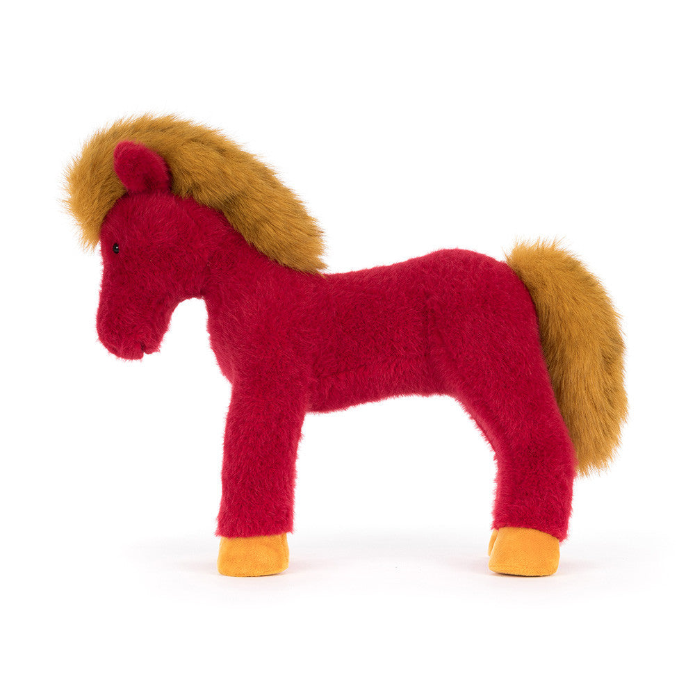 side view of Red plush horse with golden mane and tail on a white background