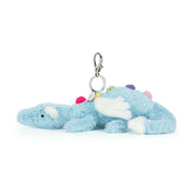 Plush jellycat blue dragon keychain or bag charm on a white background