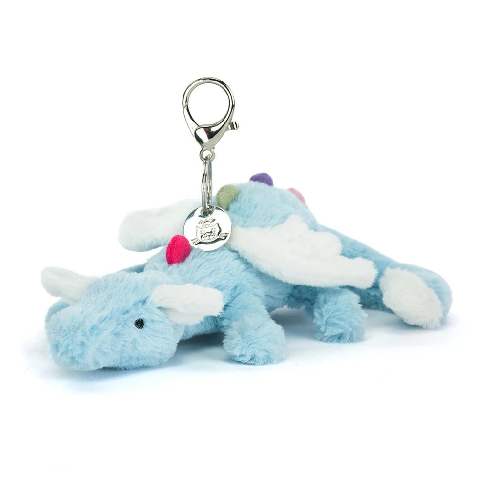 Plush jellycat blue dragon keychain or bag charm on a white background