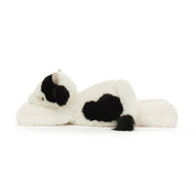 plush toy cow with black spots on white background
