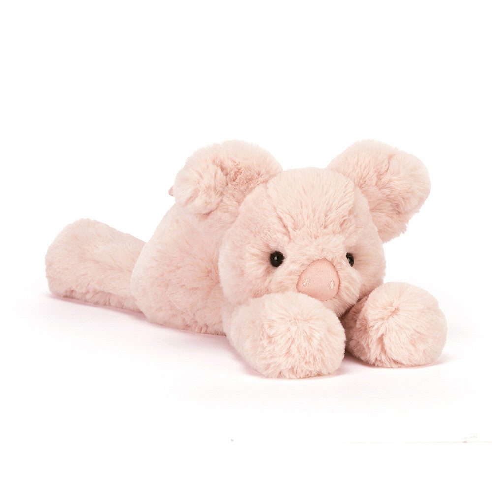 pink plush toy pig on white background
