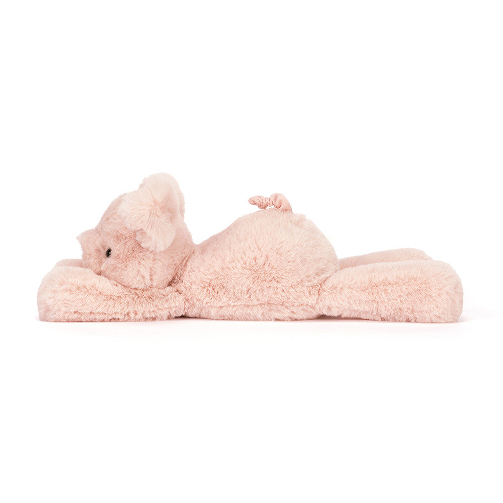 pink plush pig toy on white background