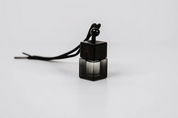 Black oil diffuser bottle from gt naked essentials on a white background