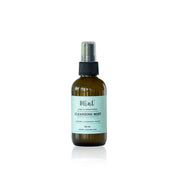 Cleansing mist bottle with a label on a white background