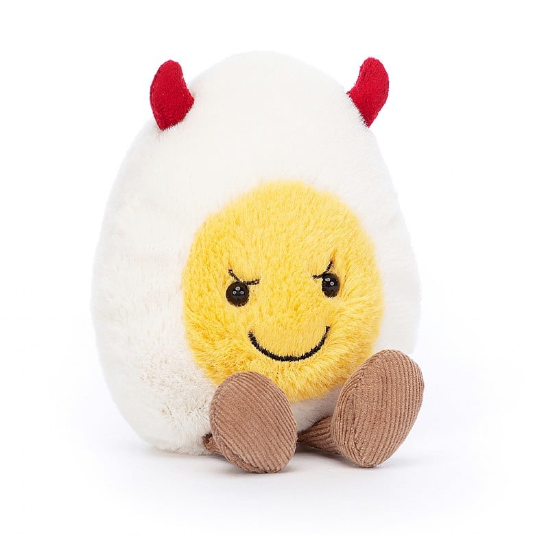 white and yellow fried egg stuffed plush toy with red devil horn and black grinning face made by jellycat