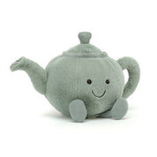 fuzzy soft stuffed plush toy of a teal teapot with black smiley face made by jellycat