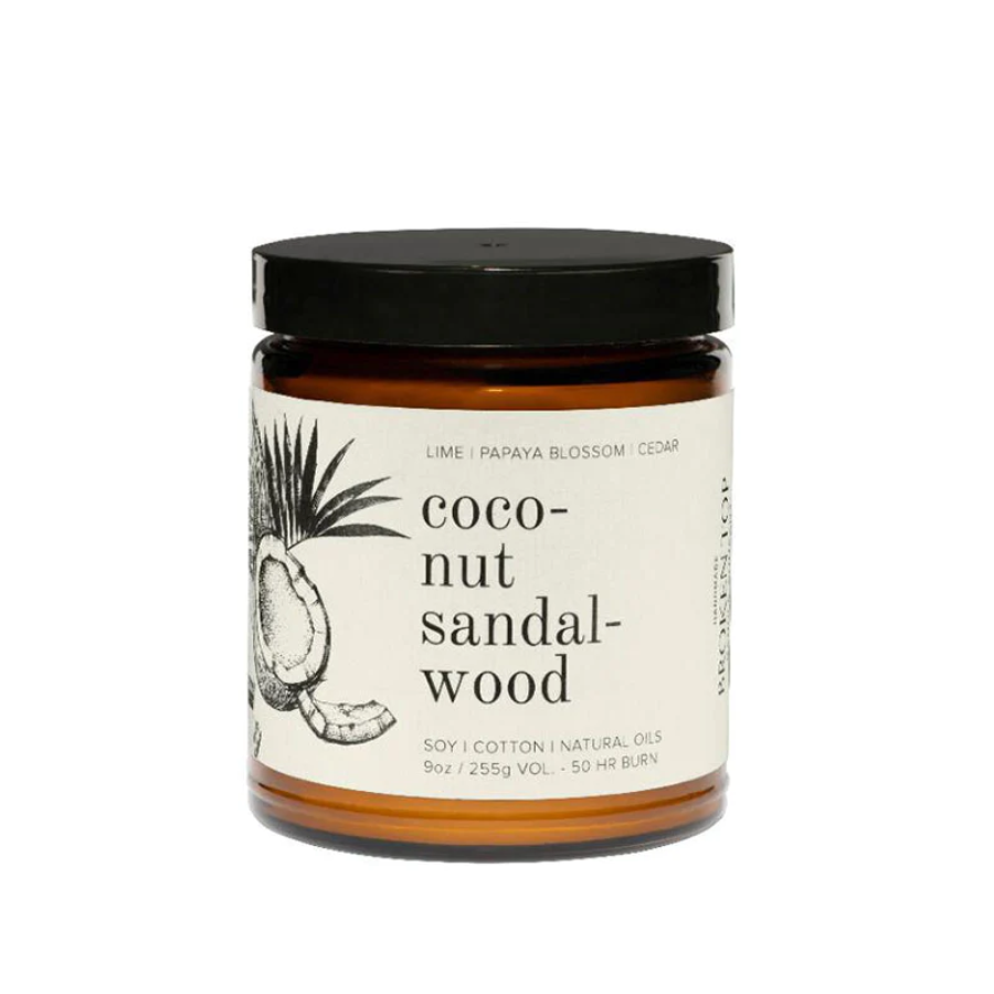 9oz coconut sandalwood candle brown jar white label black lid on white background