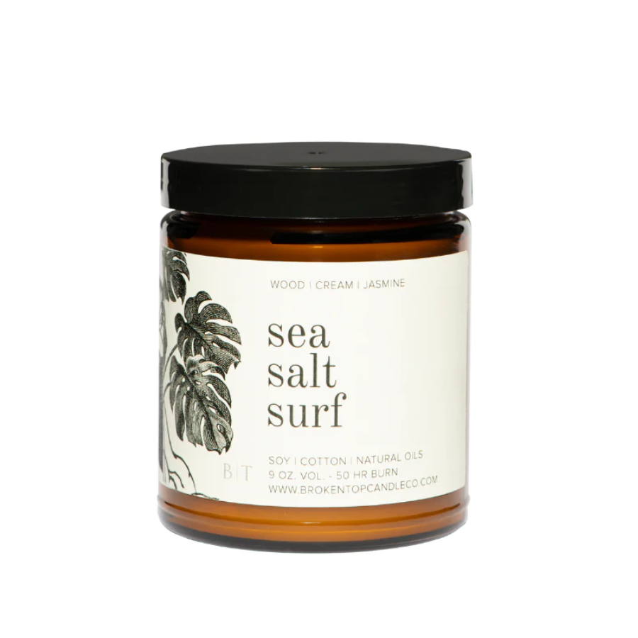 9 oz sea salt surf candle brown jar white label black lid on white background