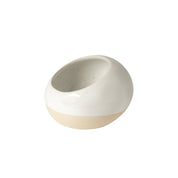 two tone glazed stoneware salt cellar; white speckled glaze with unglazed natural bottom.  One white background